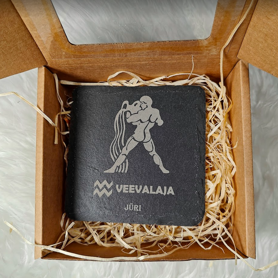 Graveeringuga tähemärgiga kivist joogialus